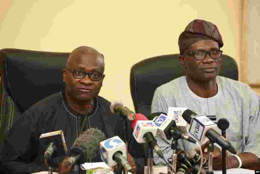 Lagos State Health Commissioner Jide Idris, left, and Commissioner for information Lateef Aderemi Ibirogba attend a news conference on the Ebola virus in Lagos, Nigeria, Aug. 26, 2014.
