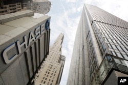 FILE - A Chase Bank office tower in New York's financial center, July 13, 2015.