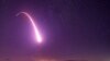 FILE - This image taken with a slow shutter speed on Oct. 2, 2019, and provided by the U.S. Air Force shows an unarmed Minuteman 3 intercontinental ballistic missile test launch at Vandenberg Air Force Base, Calif. 