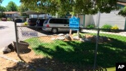 FILE - Police tape blocks off an area at a Boise, Idaho, apartment complex, July 1, 2018, where nine people were stabbed during an attack that targeted a child's birthday party the night before. 