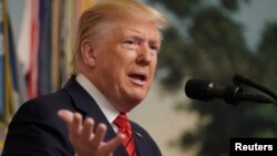 Presiden AS Donald Trump menyampaikan pernyataan di Gedung Putih, Washington, D.C terkait tewasnya pemimpin ISIS Abu Bakr al-Baghdadi di Suriah, 27 Oktober 2019. (Foto: dok).