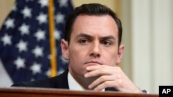 FILE - Chairman Rep. Mike Gallagher listens during a hearing of a special House committee dedicated to countering China, on Capitol Hill in Washington, Feb. 28, 2023.