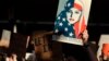 A protester holds a sign at San Francisco International Airport during a demonstration to denounce President Donald Trump's executive order that bars citizens of seven predominantly Muslim-majority countries from entering the U.S., Jan. 28, 2017.