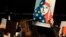 A protester holds a sign at San Francisco International Airport during a demonstration to denounce President Donald Trump's executive order that bars citizens of seven predominantly Muslim-majority countries from entering the U.S., Jan. 28, 2017.