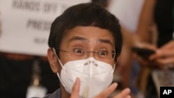 Rappler CEO and Executive Editor Maria Ressa gestures during a press conference in Manila, Philippines on June 15, 2020. 