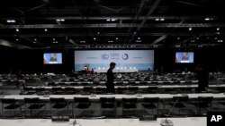 Workers prepare the main conference venue for the COP25 Climate summit in Madrid, Spain, Dec. 1, 2019. 