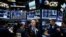 Traders work on the floor of the New York Stock Exchange (NYSE) in New York City, Nov. 7, 2016. 