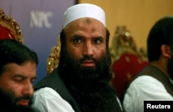 FILE - Saifullah Khalid, president of Milli Muslim League political party, is seen during a news conference in Islamabad, Pakistan, Aug. 7, 2017.