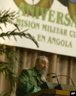 FILE - Fidel Castro, gestures while talking during an evening ceremony marking the 30th anniversary of Cuba's military mission in Angola, Dec. 2, 2005 in Havana.
