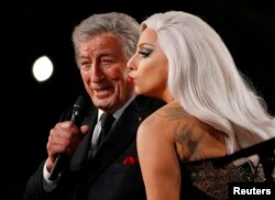Lady Gaga performs "Cheek to Cheek" with Tony Bennett at the 57th annual Grammy Awards in Los Angeles, California, Feb. 8, 2015.