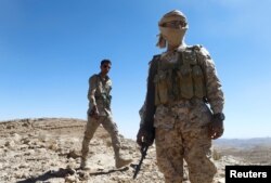 Yemeni soldiers are pictured on their position on a mountain on the frontline of fighting with Houthis in Nihem area near Sana'a, Yemen, Jan. 27, 2018.