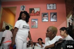 Berta Soler, left, at the Ladies in White headquarters in Havana, Cuba, the morning before her arrest. March 20, 2016. (V. Macchi/VOA)