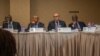 Vice President of the Confederation of African Football (CAF) Amaju Pinnink, President of CAF Ahmad Ahmad and Acting general secretary of CAF Essadik Alaoui look on during a press conference after an extraordinary meeting with CAF executives at the Kempin