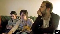 Three Portuguese workers, who started a social media campaign to vent their frustration at grim career prospects amid an acute economic crisis (file photo)