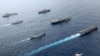 British, Canadian and Japanese vessels sail together in the Pacific Ocean on Septemebr 2021. The U.S. and its allies are becoming assertive in their approach toward a rising China. (UK Ministry of Defence via AP)