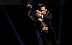 Juan David Vargas and Paulina Mejia, representing the city of Cali, Colombia, perform during the Stage style final round at the Tango World Championship in Buenos Aires, Argentina August 21, 2019.
