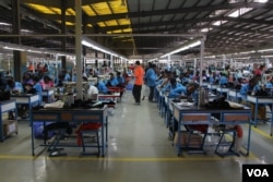 Workers construct shoes at the George Shoe Factory, located in the industrial zone of Addis Ababa, Ethiopia. (VOA)