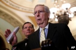 FILE - Senate Majority Leader Mitch McConnell of Kentucky speaks to members of the media on Capitol Hill in Washington, April 2, 2019.