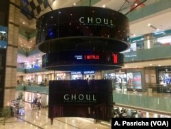 With original shows like the horror show "Ghoul" streaming on Netflix, the entertainment giants hopes to woo Indian viewers. The advertisement is seen in a swanky mall in Gurgaon near Delhi.