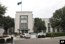 FILE - A car pulls onto the grounds of Saudi Arabia's embassy in Washington, Oct. 11, 2011. The interests of the kingdom are reportedly represented by at least two dozen lobbying firms in the U.S. capital.