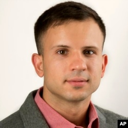 FILE- This undated file photo provided by the Calixto family shows Lucas Calixto. In mid-July the Army reversed the discharge of Brazilian reservist Calixto, who had sued.