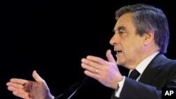 French conservative presidential candidate Francois Fillon gestures as he delivers his speech during a campaign meeting in Toulon, southern France, Friday, March, 31, 2017.