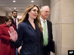 FILE - Hope Hicks, White House communications director at the time, arrives to meet behind closed doors with members of the House Intelligence Committee, at the Capitol, in Washington, Feb. 27, 2018.