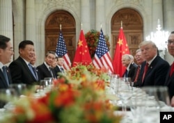 President Donald Trump and China's President Xi Jinping lead their respective delegatiosn during their bilateral meeting at the G-20 Summit, Dec. 1, 2018, in Buenos Aires, Argentina.