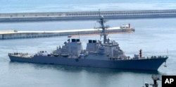 FILE - The USS Curtis Wilbur, a 8,950-ton Aegis destroyer of the U.S. Navy, arrives at a naval base in Busan, South Korea, June 4, 2010.