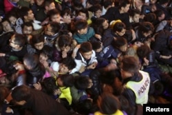 A view of a stampede is seen during the New Year's celebration on the Bund, a waterfront area in central Shanghai, Dec. 31, 2014.