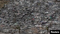 An aerial view of the ruins of houses after the devastation of super Typhoon Haiyan in Tacloban city in central Philippines, Nov. 11, 2013.