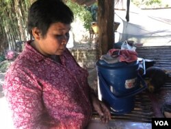Pork Kep, a resident of in Siem Reap City’s Chreav commune, was granted an Equity Card but has never used it for health care. March 15, 2019. (Sun Narin/VOA Khmer)