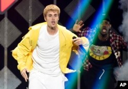 FILE - Justin Bieber performs at the 2016 Jingle Ball at Staples Center on Dec. 2, 2016, in Los Angeles.
