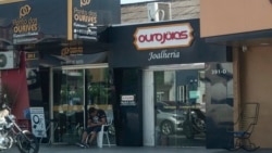 FILE - Gold stores line a street in Boa Vista, Brazil, Wednesday, Nov. 3, 2021.