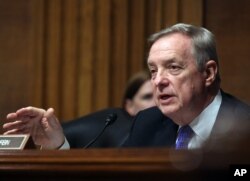 FILE - Illinois Democratic Senator Dick Durbin pledges to be "respectful of the office of the presidency" during Tuesday speech by President Donald Trump.