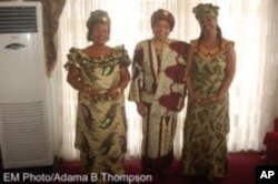 President Sirleaf (center) and Mrs. Quiwonkpa and Mrs. Doe