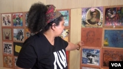 Artist Shante Bullock is descended from slaves and cannot trace them back more than a few generations. She says even though her ancestors did not come voluntarily, she shares the hope of others whose ancestors came to the U.S. (Jsoh/VOA)