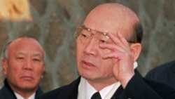 FILE - Former South Korean President Chun Doo-hwan speaks in front of his home in Seoul, South Korea, Dec. 2, 1995.