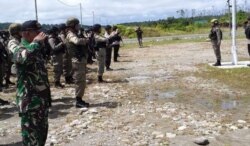 Apel gabungan TNI-Polri melakukan apel pengamanan Pemilu 2019 lalu di Polsek Kenyam, Nduga (foto: ilustrasi).