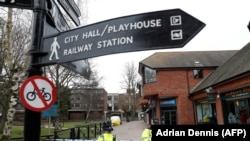 U.K. -- Police stand at a cordon securing the part of The Maltings shopping center in Salisbury, March 9, 2018.