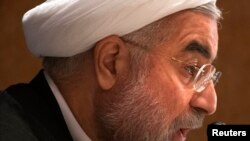 Iran's President Hassan Rouhani speaks to journalists during a news conference in New York September 27, 2013.