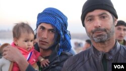 Once a farmer from Mosul, Ibrahim Inaimy (R) fled to the Hassan Sham camp in Iraqi Kurdistan last week, saying Islamic State militants were brutalizing the people as the Iraqi Army recently closed in before taking his area, on Dec. 7, 2016. (H.Murdock/VOA)