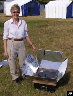 Patricia McArdle with a solar cooker, similar to the one she introduced to Afghan villagers.