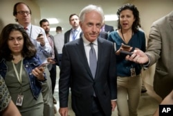 FILE - Senate Foreign Relations Committee Chairman Bob Corker, R-Tenn., talks to reporters as he returns to his office from a vote, on Capitol Hill in Washington, Oct. 25, 2017.