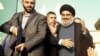 Lebanon's Hezbollah leader Sayyed Hassan Nasrallah (R), escorted by his bodyguards, makes a rare public appearance as he greets his supporters at an anti-U.S. protest in Beirut's southern suburbs September 17, 2012. 