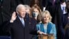 Joe Biden is sworn in as the 46th President of the United States as his wife Jill Biden holds a Bible on the West Front of the U.S. Capitol in Washington, Jan. 20, 2021.