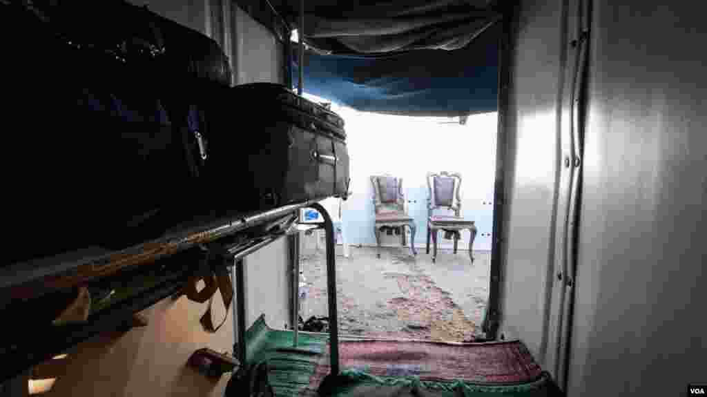 Mohammed al Jassem’s tiny living space. In the wake of the attacks, he says he keeps his bags packed and ready to leave should any further violence arise. (J. Owens for VOA)