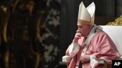 Pope Francis celebrates mass on the occasion of 500 years of Christianity in the Philippines, in St. Peter's Basilica, at the Vatican, Sunday, March 14, 2021. (Tiziana Fabi/Pool photo via AP)