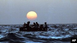 Des réfugiés de la mer ayant fui le régime Castro à Cuba (AP)