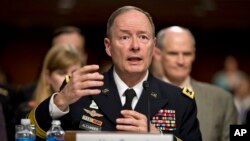 Direktur Badan Keamanan Nasional Amerika Jenderal Keith Alexander memberi keterangan di hadapan komisi Kongres, Rabu (12/6). 